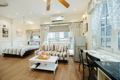 Habitación Doble Deluxe con balcón — Maison M Boutique Stay - Hanoi Old Quarter
